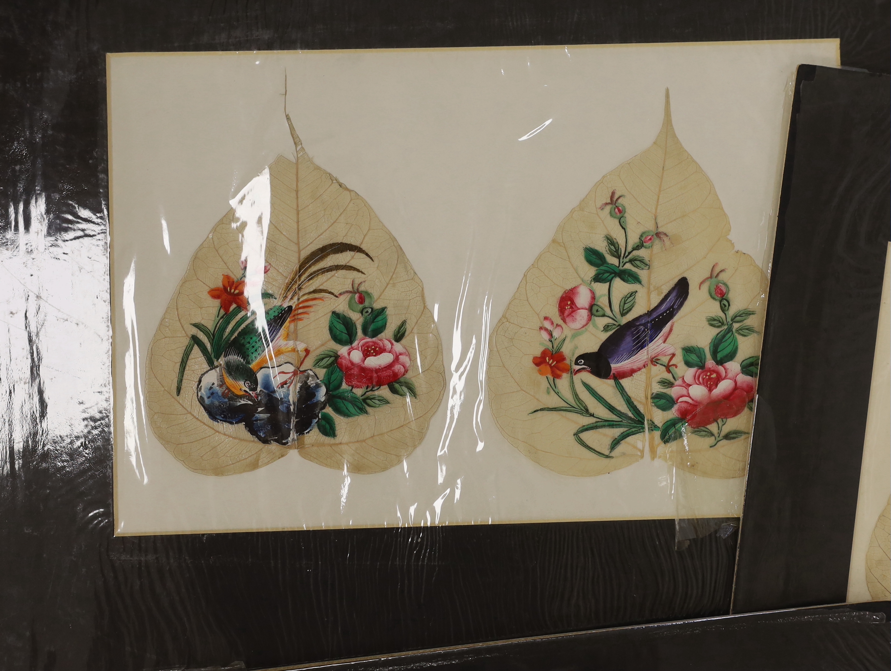 19th century Chinese School, twenty gouaches on mulberry leaves, Studies of figures, birds and flowers, largest 24 x 14cm, unframed